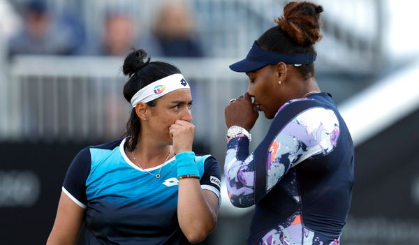 Serena Williams (right) in her round of 16 doubles match with Ons Jabeur on centre court on day four of the Rothesay International Eastbourne at Devonshire Park, Eastbourne. Picture date: Tuesday June 21, 2022.