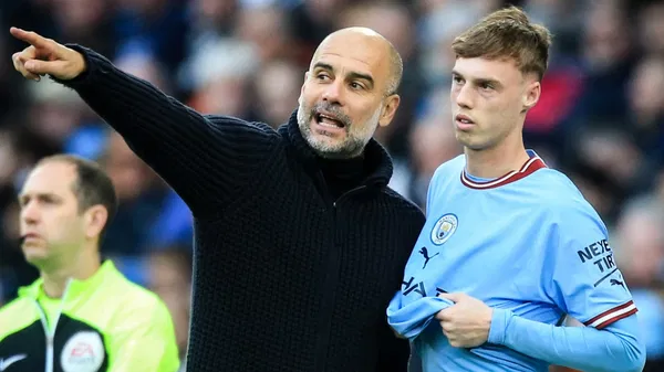 Pep Guardiola and Cole Palmer