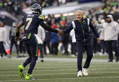 Pete Carroll and Geno Smith