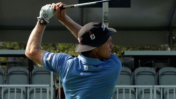 Peter Malnati Wearing Red and black ribbon pin to give tribute to Grayson Murray