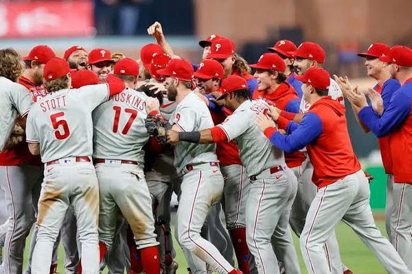 Philadelphia Phillies team huddle for celebration