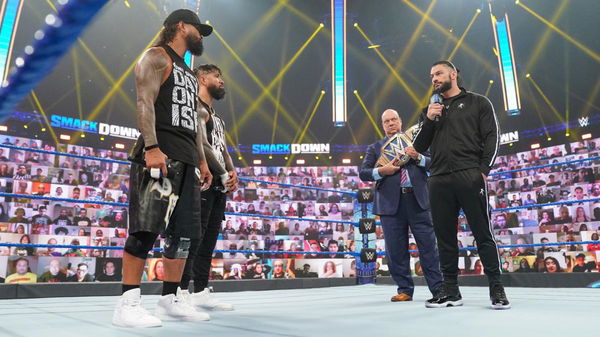 Roman Reigns with advocate Paul Heyman Jimmy Uso and Jey Uso