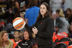Sep 2, 2025; Phoenix, Arizona, USA; Indiana Fever guard Caitlin Clark (22) walks out on to the floor before a game against the Phoenix Mercury at PHX Arena.