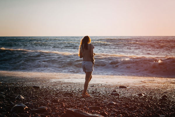 Brunette woman at the sea on sunset, Brunette woman at the sea on sunset, Brunette woman at the sea on sunset model rele