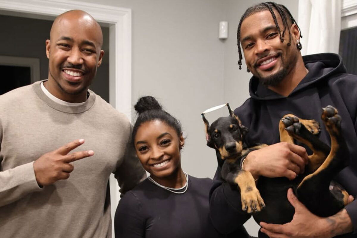 Simone Biles and Jonathan Owens with new puppy