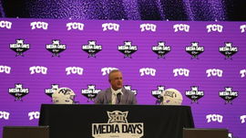 Sonny Dykes talks to the media