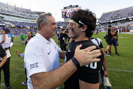 TCU head coach Sonny Dykes and quarterback Josh Hoover (10)