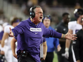 TCU head coach Sonny Dykes argues a call in the first half of an NCAA college football game against Baylor