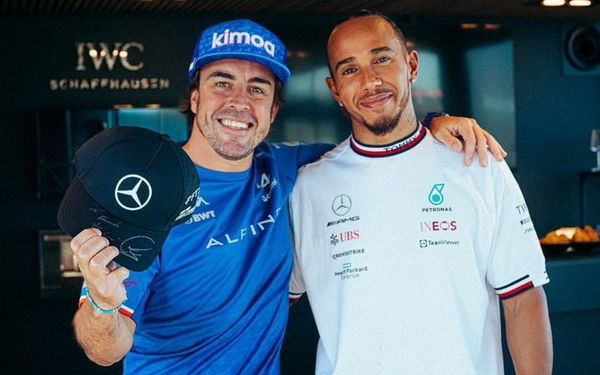 Fernando Alonso with Lewis Hamilton