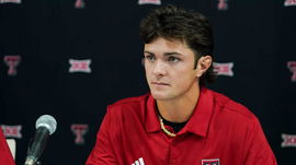 Texas Tech quarterback Behren Morton answers questions from the media during 2025 Big 12 Football Media Days