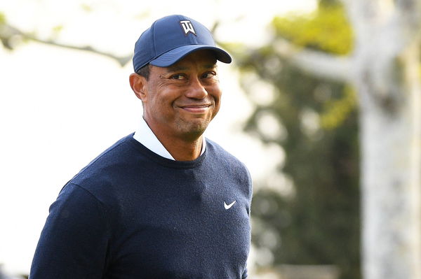 PACIFIC PALISADES, CA &#8211; FEBRUARY 16: Tiger Woods looks on after his birdie putt on the 18th hole during the first round