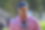 Tiger Woods with a wide smile