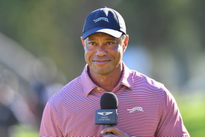 Tiger Woods with a wide smile