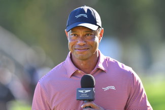 Tiger Woods with a wide smile