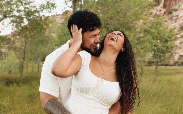 Troy Fautanu and partner