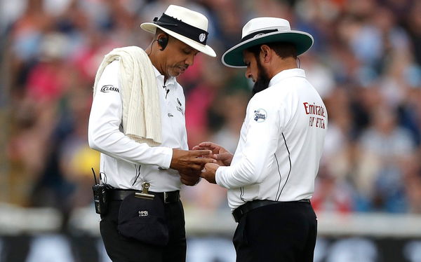 Umpires Aleem Dar and Joel Wilson