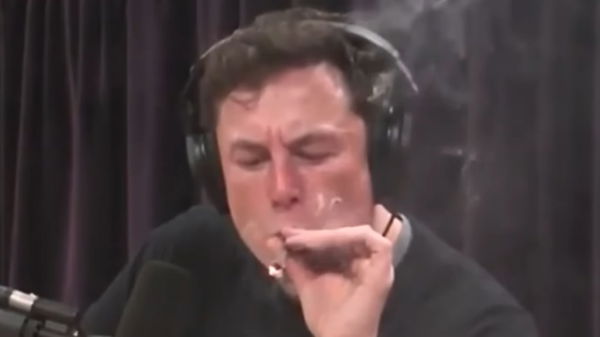 Elon Musk smoking