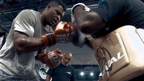 Francis Ngannou and Mike Tyson