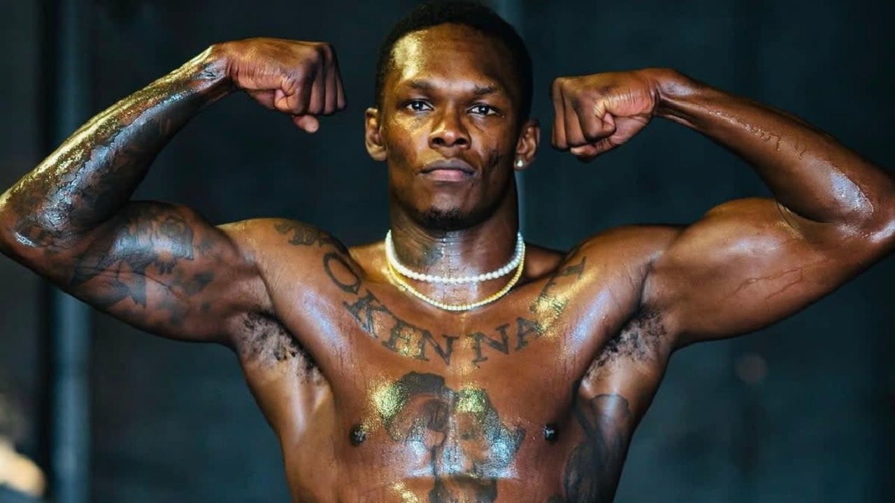 What Do Israel Adesanya’s Tattoos Mean? Broken Native, Deadpool, Naruto & More