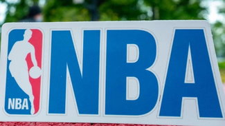 The NBA logo on the playground.