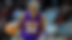 Kobe Bryant dribbling the ball.