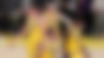 Luka Doncic and Austin Reaves with their Lakers teammates