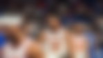 Knicks players walking to the bench
