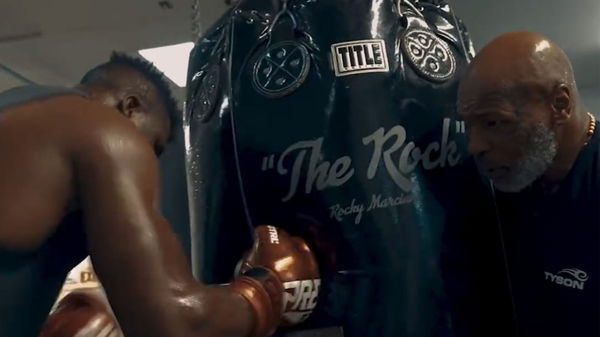 Francis Ngannou and Mike Tyson