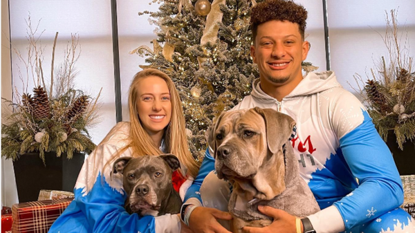 Brittany Mahomes and Patrick Mahomes with thier dogs Steel &amp; Silver