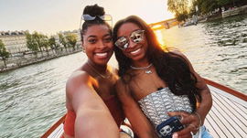 Simone Biles, and Adria Biles