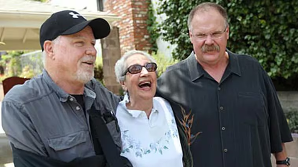 Andy Reid with mother and brother