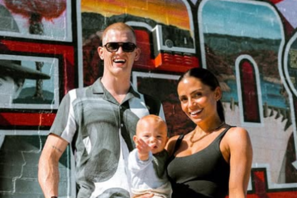 Ian Garry with his wife and son