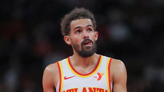 Trae Young look on during the second half