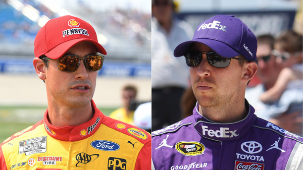 2022 NASCAR Cup Series champion Joey Logano and Joe Gibbs Racing driver Denny Hamlin