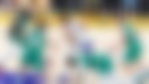 Celtics players defend against Lakers