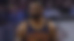 LeBron James stands on the court
