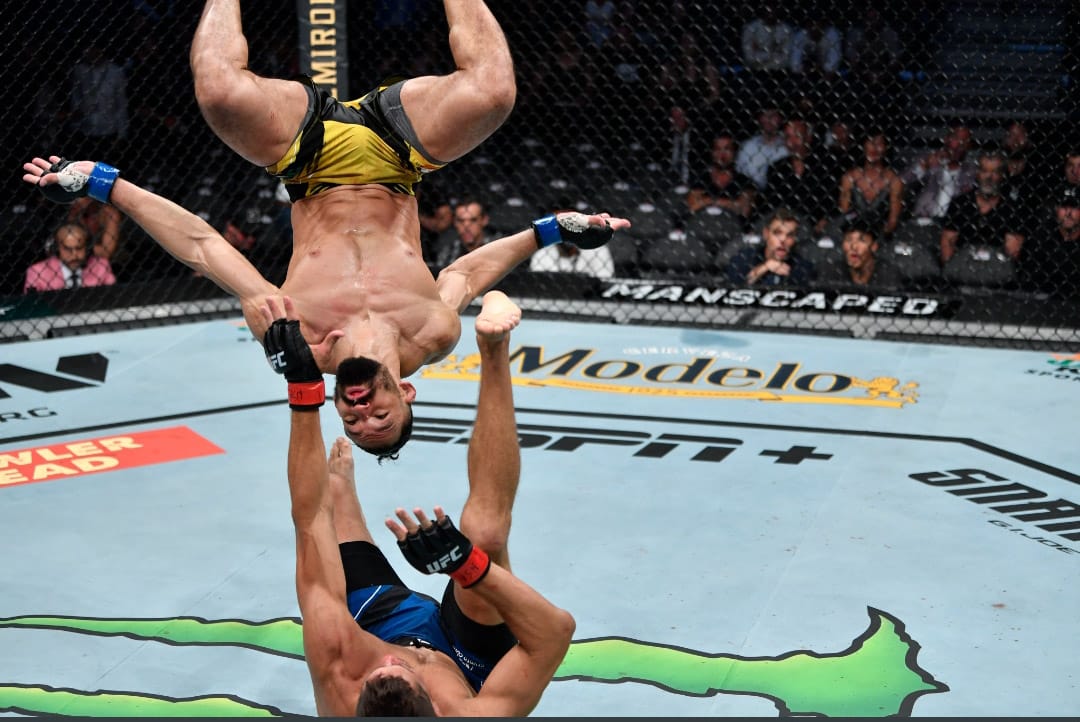 VIDEO: Michel Pereira Lands Insane Illegal Backflip Head Kick at UFC 264 -  EssentiallySports