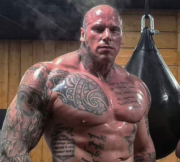 After Getting Punched by 6-Feet-8, 350 Lbs Bodybuilding Giant Martyn Ford,  UFC Legend Michael Bisping Reveals He Still Has Swollen Jaw After 6 Weeks -  EssentiallySports