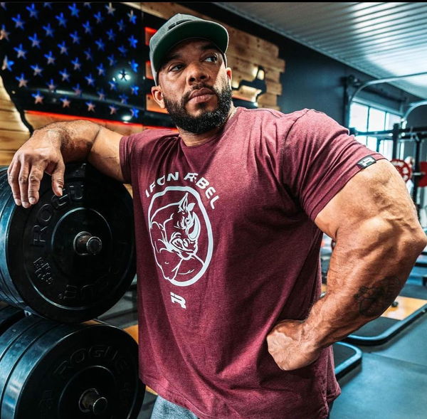 6 ft. Tall, Shredded Bodybuilding Beast, Sergio Oliva Jr., Dwarfed by a  Bellman in the UAE: “I Felt a Tap on My Shoulder and..” - EssentiallySports