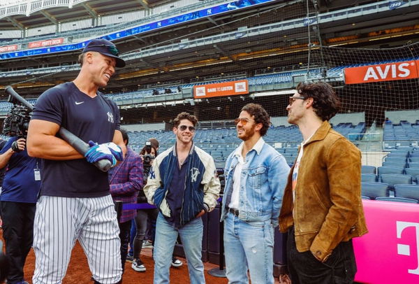 Aaron Judge alongside Jonas Brothers