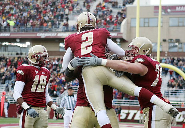 Boston College football team celebrating