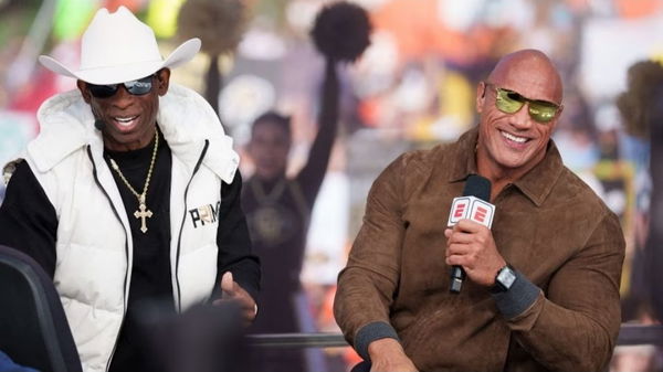 Colorado Buffaloes head coach Deion Sanders and celebrity guest picker Dwayne Johnson on the set of ESPN&#8217;s College GameDay.