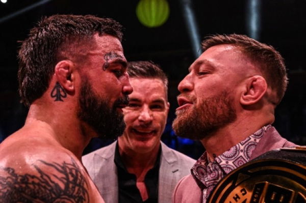 Mike Perry and Conor McGregor face off