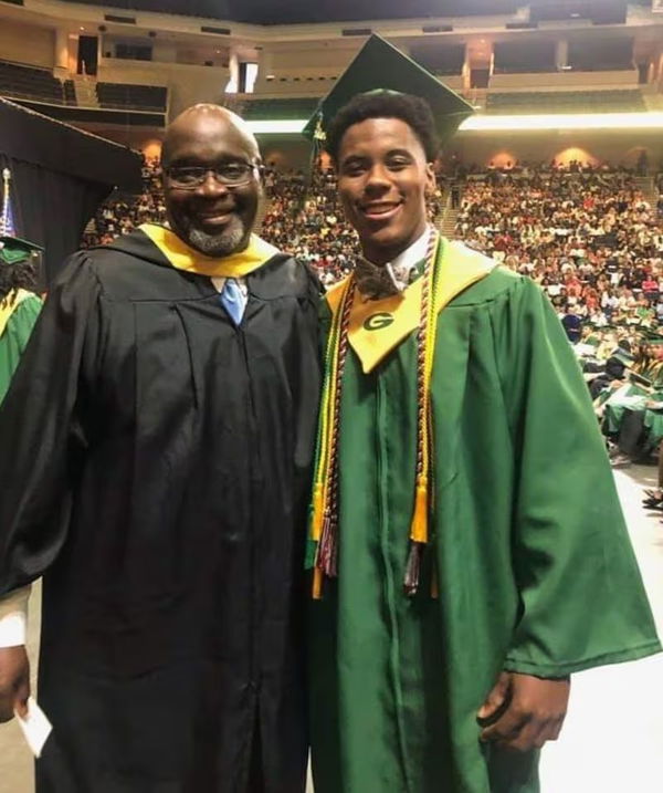 Jeremiah Smith with his parent