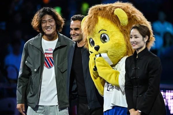 Zhizhen Zhang and Roger Federer