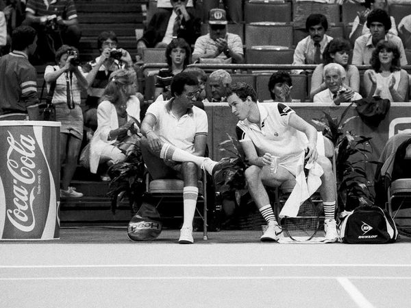 Arthur Ashe, John McEnroe