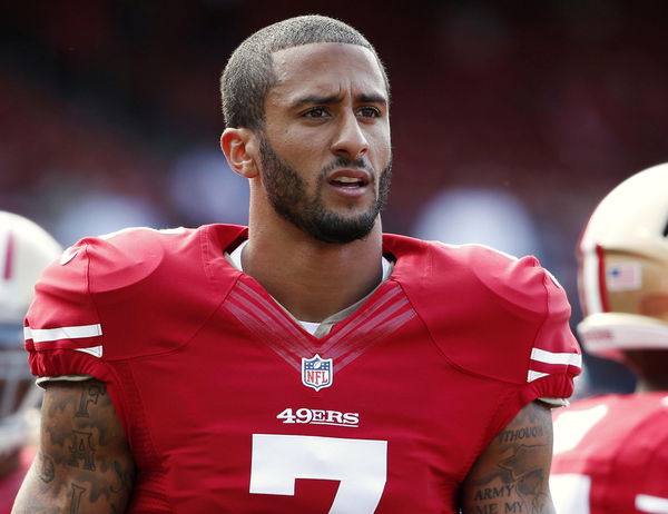 San Francisco 49ers&#8217; Kaepernick stands on the field before their NFL pre-season football game against Denver Broncos in San Francisco