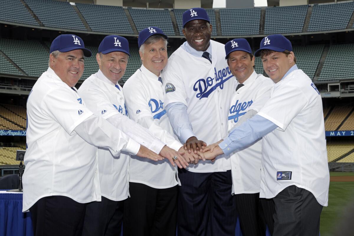 Mark Walter, Todd Boehly, Magic Johnson