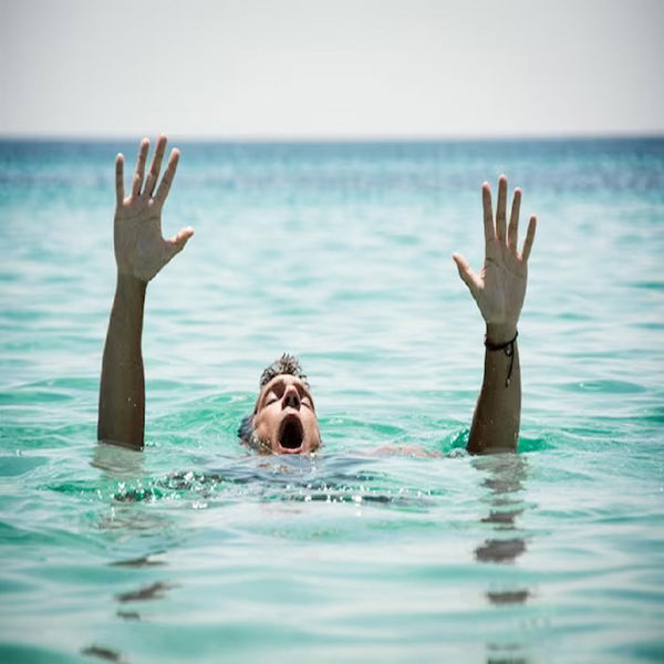 drowning-man-sea-asking-help-with-raised-arms_360066-20763