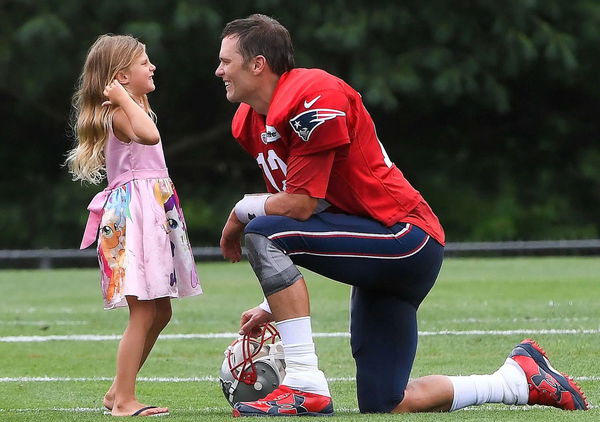 Tom Brady Enjoys Football in the Pool with Daughter